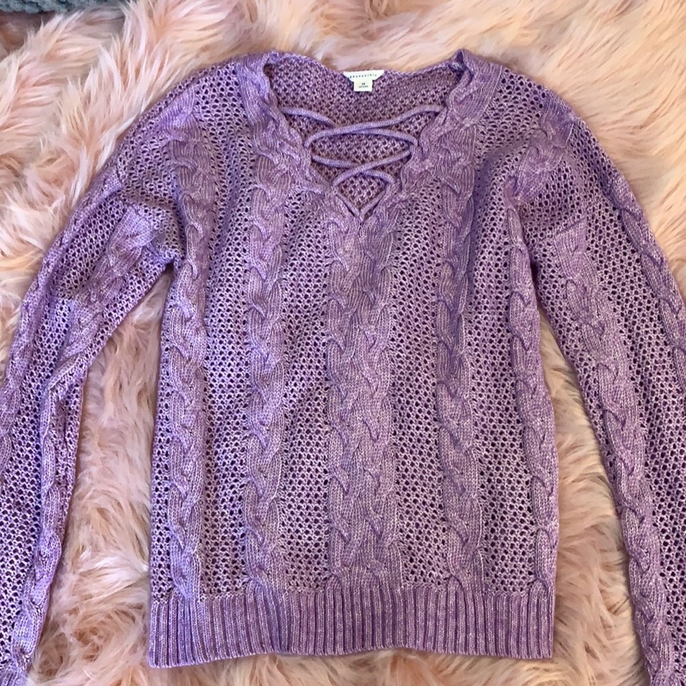 Purple sweater.